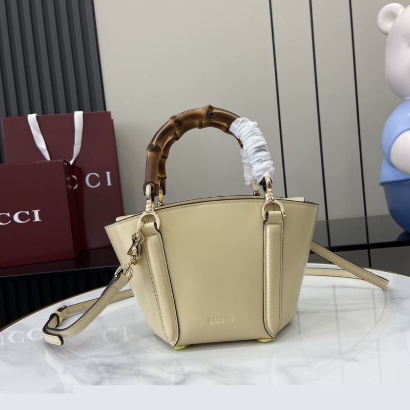 G*u*i top handle bags